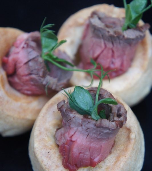 Rare roast beef and horseraddish in a canape Yorkshire pudding