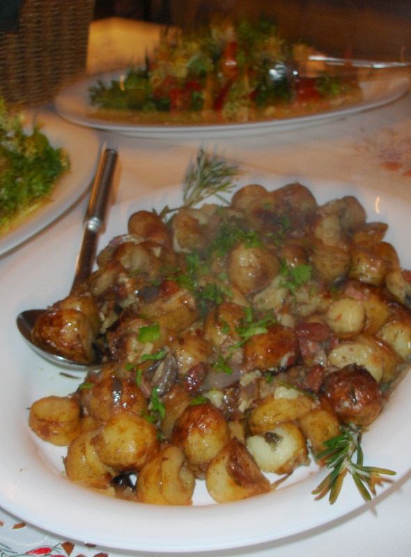 New potatoes roasted with rosemary, galric and red onions